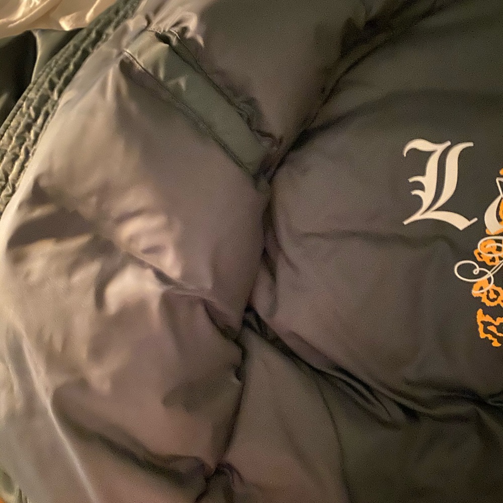 Juicy Couture Bomber with Faux Fur Trimmed Hood.